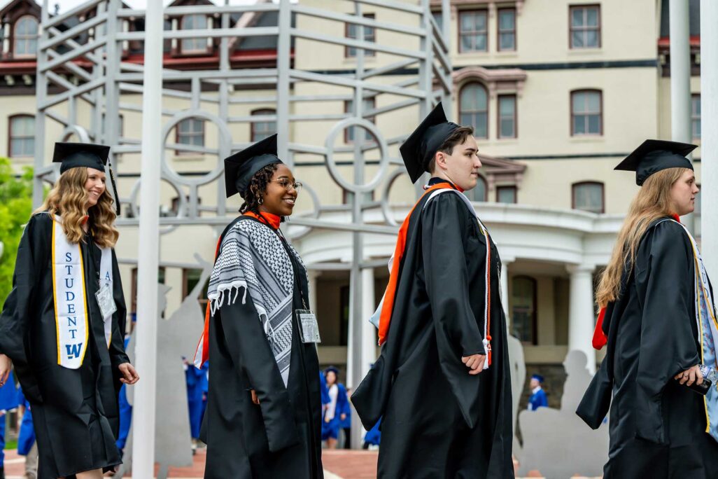 wid_msw_careers_hero Widener University graduates walking in front of building in cap and gown
